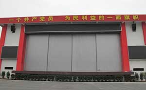 華西村舞臺大門工業(yè)門案例 - 中出網(wǎng)-智能出入口與停車充電門戶