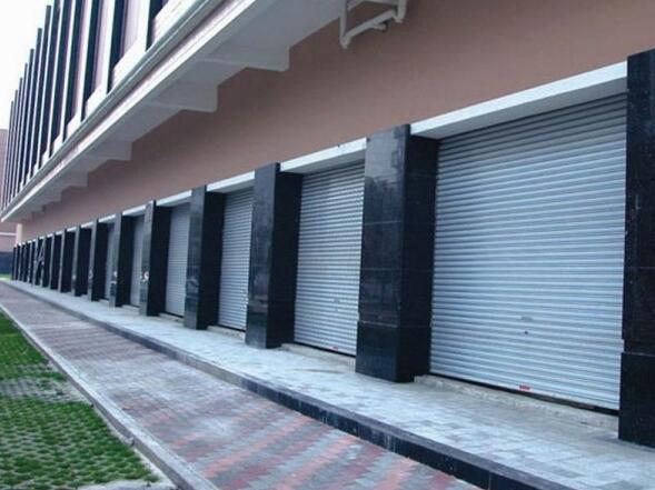 廣州某小區(qū)全小區(qū)卷閘門案例 - 中出網(wǎng)-智能出入口與停車充電門戶