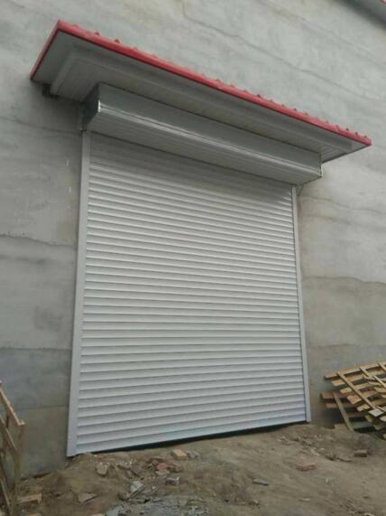 綠色環(huán)保白城保溫卷簾門安裝有蹊徑